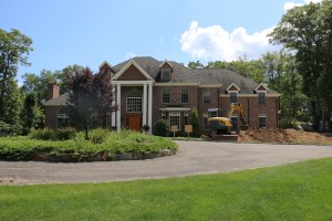 foundation dig by excavator on home in easton connecticut